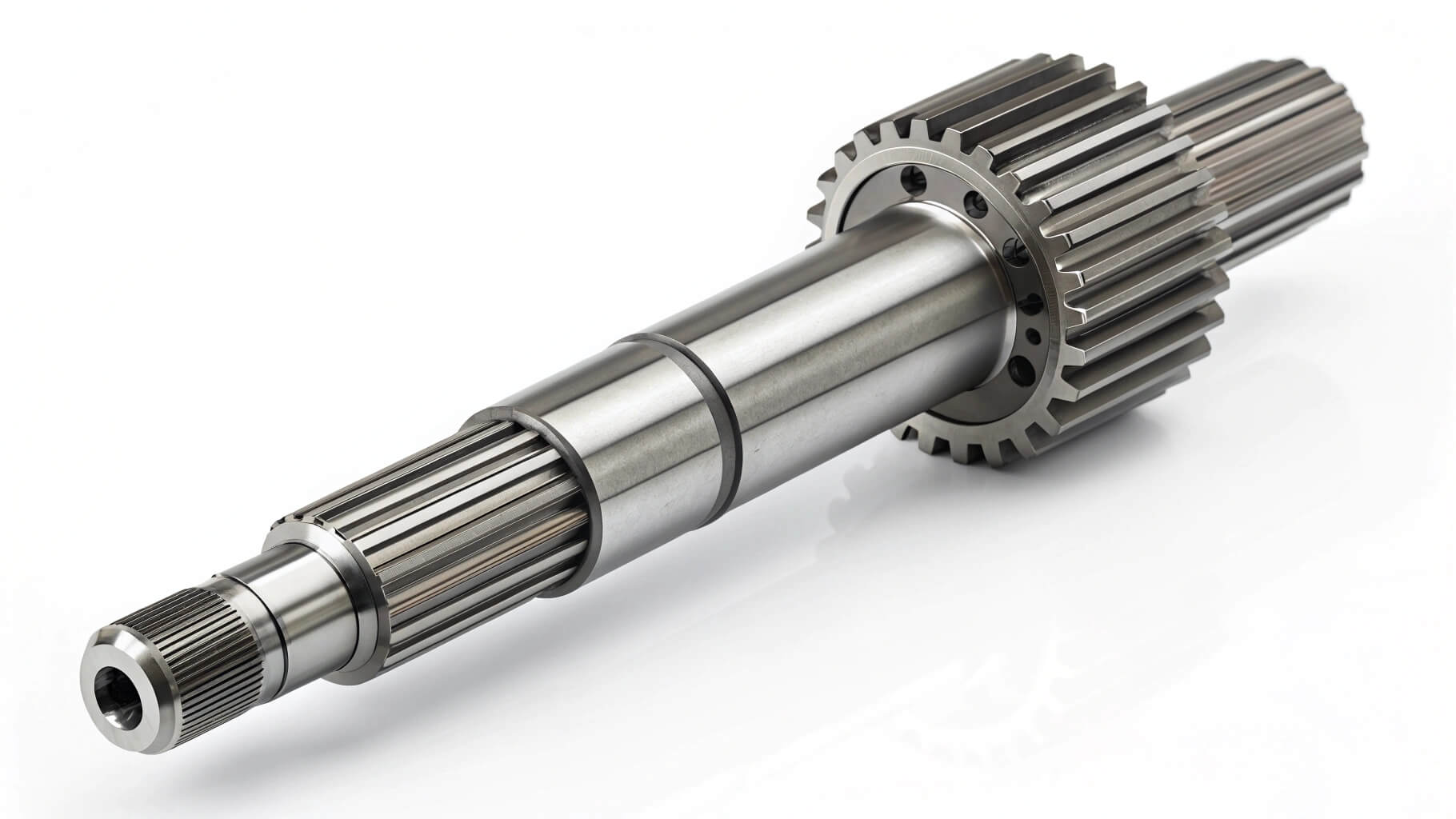 Precision machined gear shaft showing integrated gear teeth and bearing journal